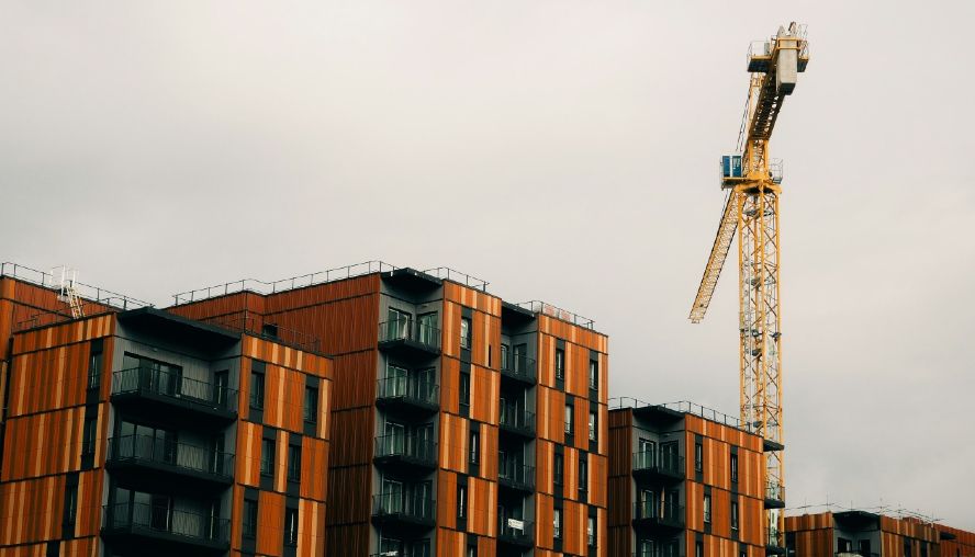 Crane towering above office blocks