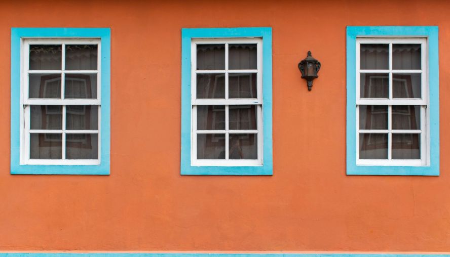 Orange house with blue windows